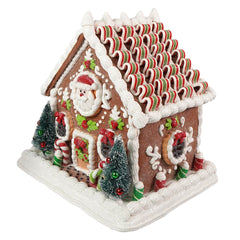 9.25“ LED Lighted Gingerbread House With Santa & Ribbon Candy Roof Table Piece