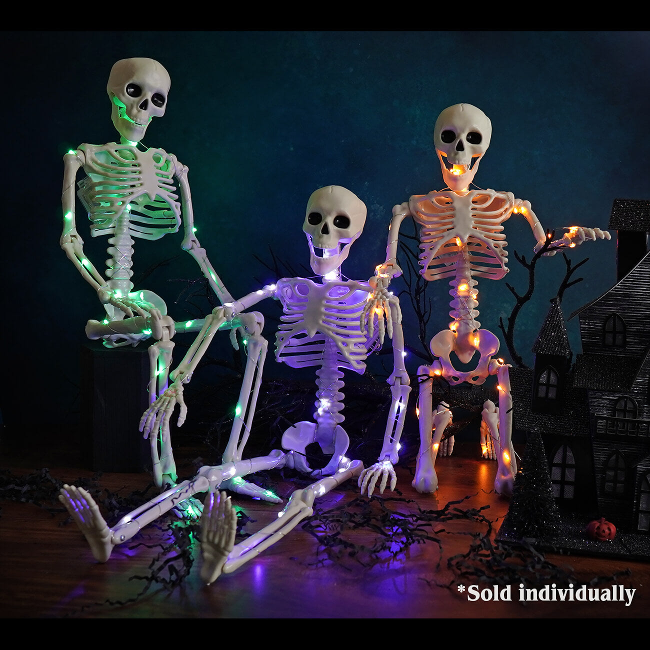 24" Purple LED Lighted Halloween Hanging & Jointed Skeleton